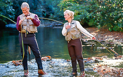 Retired couple having fun fly fishing at Lost River