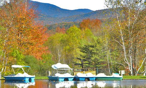 Boats and White Mountains in background